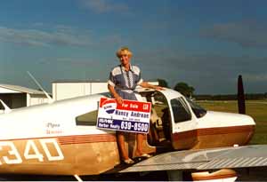 Nancy Andreae and her plane from which many of the aerial photos were taken.